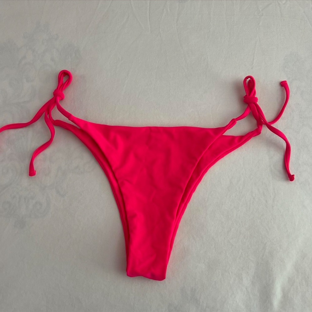 Pink bikini bottoms with adjustable straps size medium